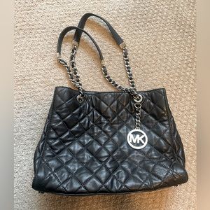 Michael Kors black bag.